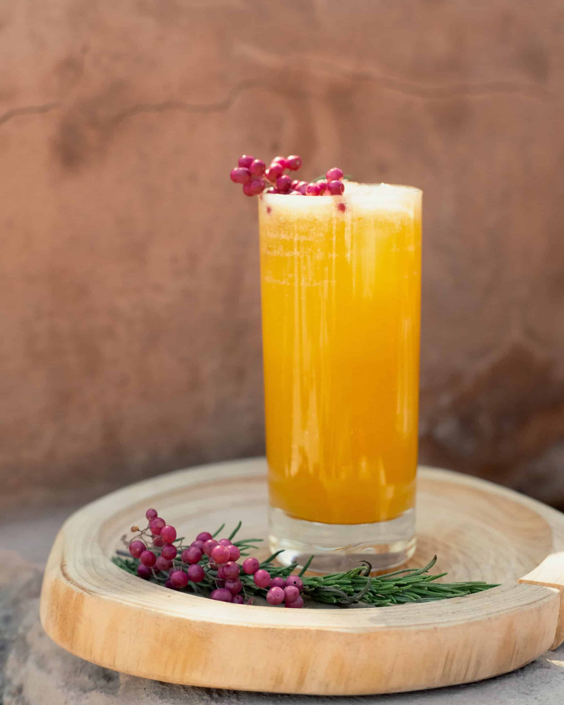 yellow drink with berries 
